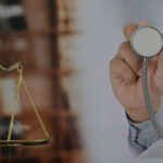 Doctor discussing medical malpractice case with patient.